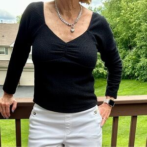 Maeve black top with sweetheart neck line and square neck in back.  Size M